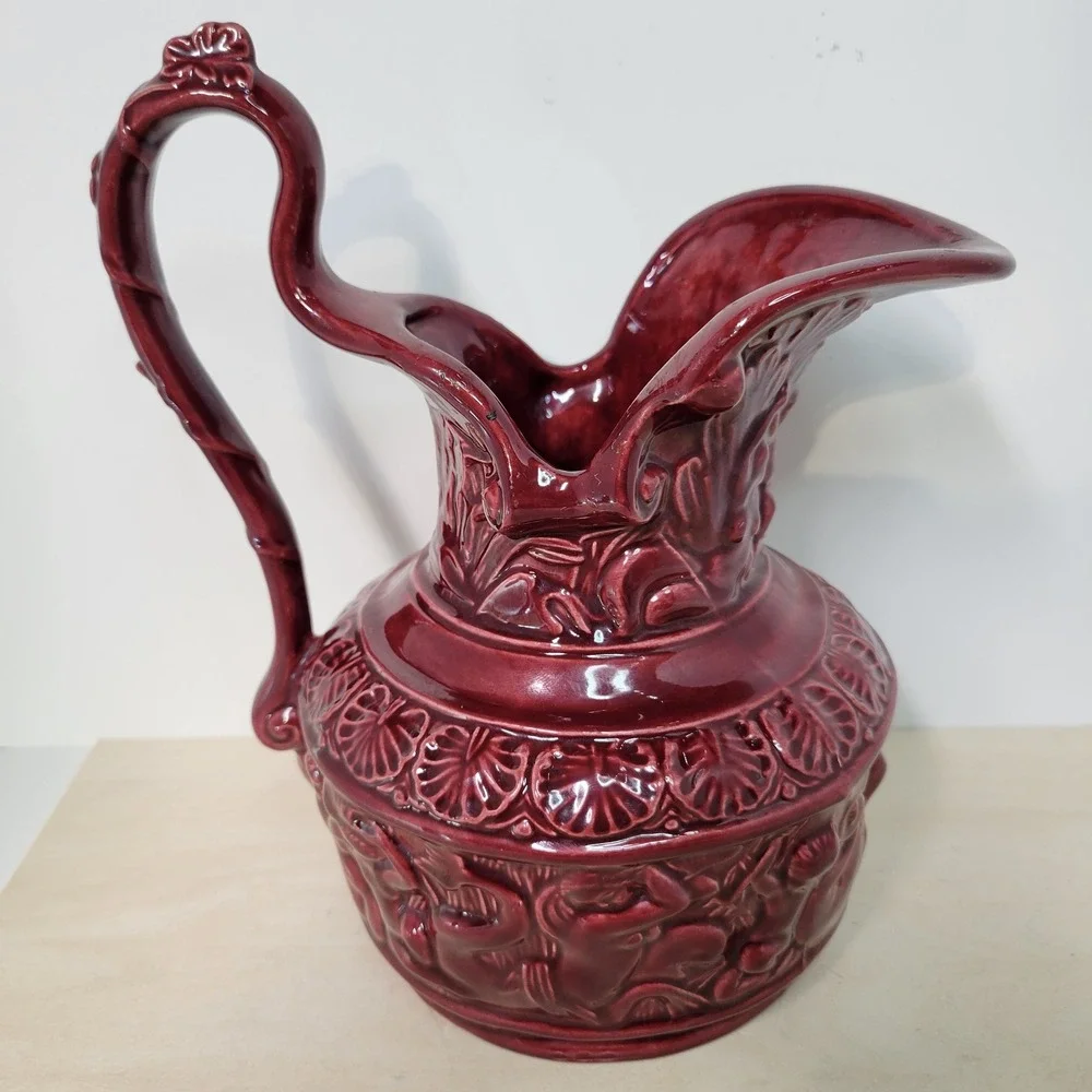 Vintage Burgundy Ceramic Pitcher Jug Relief Figures‎ Embossed Floral Design